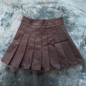 Black pleated mini skirt